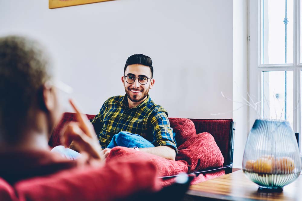 Funny,Male,In,Classic,Eyewear,Have,Positive,Conversation,With,Blurred