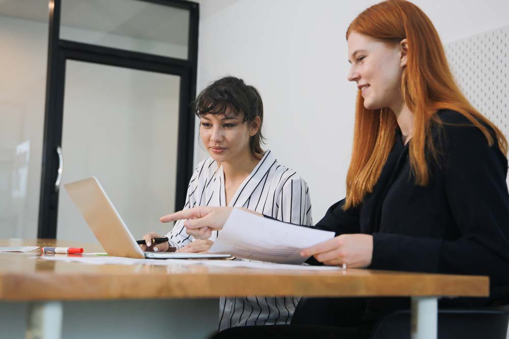 Business,Discussions.,Shot,Of,Businesswomen,Brainstorming,In,An,Office
